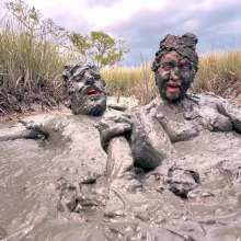 Messy Temptress: Sloppy Handjob in the Mud