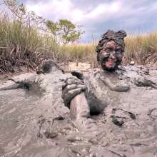 Messy Temptress: Sloppy Handjob in the Mud