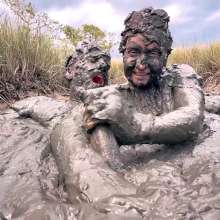 Messy Temptress: Sloppy Handjob in the Mud