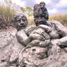 Messy Temptress: Sloppy Handjob in the Mud