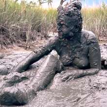 Messy Temptress: Sloppy Handjob in the Mud