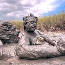 Messy Temptress: Sloppy Handjob in the Mud