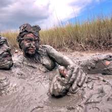 Messy Temptress: Sloppy Handjob in the Mud