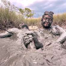 Messy Temptress: Sloppy Handjob in the Mud