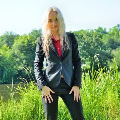 ufa217: Irma gets wet in her business suit in the river.