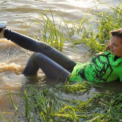 ufa217: Greta swim in the lake fully clothed.