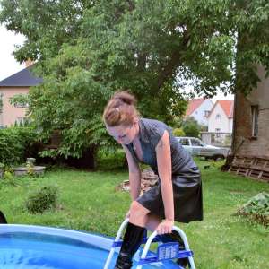 lofw: Where is this from?  (Leatherskirt and boots in pool)