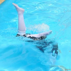ufa217: Girls in drindles swim in the pool after work on the farm.