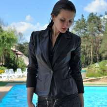 ufa217: Kira in a business suit swims in the pool.