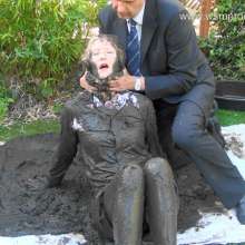 WSMProductions: CC in muddy garden play in their business suits--wsm