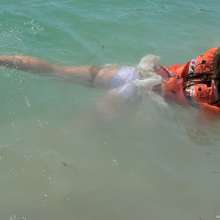ufa217: Elena swims in the lake.
