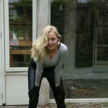 eileenvogel: Eileen getting covered in custard wearing leatherlook leggings