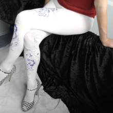 Trouso: Lily's back--in white tights and black treacle!
