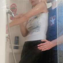 Ag Italian Wetlook: Olesya fully-clothed in shower with black leggings and white t-shirt