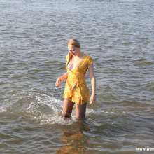 eileenvogel: Eileen enjoying a summer day at the river in a yellow dress