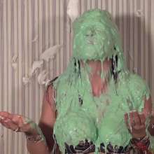Anglefan: Zarah green slimed in a thong