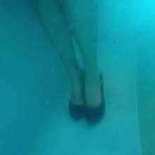 Wet Live Team: Heels and Coat Got Completely Wet in the Pool!  Wetlook Girl