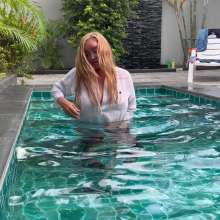 Wet_look_elena: Heels Stockings and Thin White Shirt in Pool