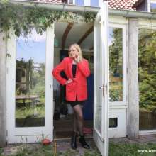 eileenvogel: W382 Eileen in a red black business suit in kiddy pool