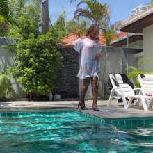 Wet_look_elena: Seethrougth White Drees and Stockings in the Pool