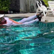 Wet_look_elena: White Leggings and Black Stockings in the Pool