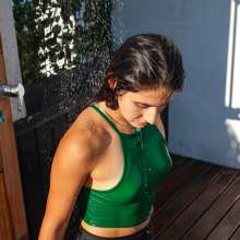 wet.look.me: Wetlook girl in sport outfit gets wet in shower | Wetlook.biz