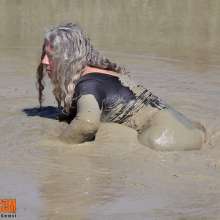 FOXY: Edwie in mud with black Lycra
