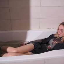 Wet Live Team: Mila Got Wet in Shorts and a Fishnet-shirt, Wetlook Girl