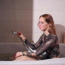 Wet Live Team: Mila Got Wet in Shorts and a Fishnet-shirt, Wetlook Girl