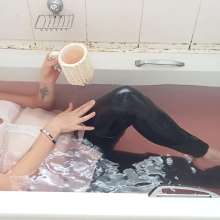 Thefetishgirl: Wet Leather Pants and White Top