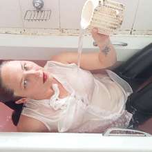 Thefetishgirl: Wet Leather Pants and White Top