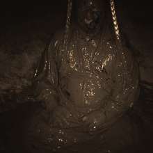 Swamp Angel: 86 Ir Latex Mask and Leather Skirt Mud Bath