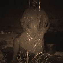 Swamp Angel: 86 Ir Latex Mask and Leather Skirt Mud Bath