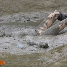 FOXY: julia with her head in mud