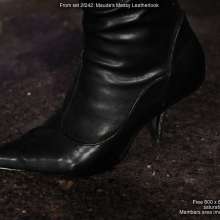 DungeonMasterOne: Maude gets messy in a black leather-look dress and thigh-high boots!