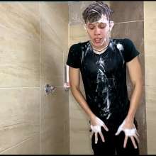 WETColours: Dario in the Shower in Green Shirt and Pants with Shampoo