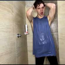 WETColours: Dario in the Shower with a Blue Tank Top and Pants