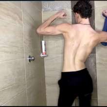 WETColours: Dario in the Shower with a Blue Tank Top and Pants