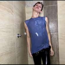 WETColours: Dario in the Shower with a Blue Tank Top and Pants