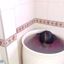 Hikari-Studio-Wam: Hikari Showers in Her Bucket of Water.