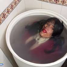 Hikari-Studio-Wam: Hikari Showers in Her Bucket of Water.