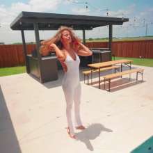 WetlookFashion: Jasmine Gets Wet in a White Jumpsuit and Heels
