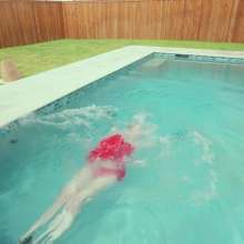 WetlookFashion: Jessica Has Some Pool Fun Wearing a Sexy Satin Dress