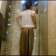 WETColours: Nixon Has Fun in Shower Wearing a White T-shirt with Cap