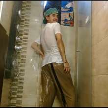 WETColours: Nixon Has Fun in Shower Wearing a White T-shirt with Cap