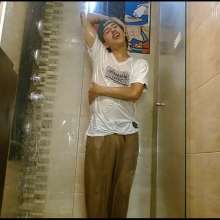 WETColours: Nixon Has Fun in Shower Wearing a White T-shirt with Cap
