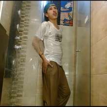 WETColours: Nixon Has Fun in Shower Wearing a White T-shirt with Cap