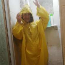 Thefetishgirl: Switch Rainwear in Shower