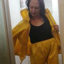 Thefetishgirl: Switch Rainwear in Shower