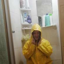 Thefetishgirl: Switch Rainwear in Shower